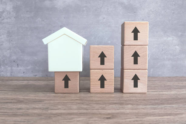 Ascending Property Value Concept with House Icon and Arrow Blocks