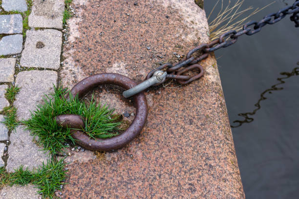 Metal ring and chain attached to a stone dock