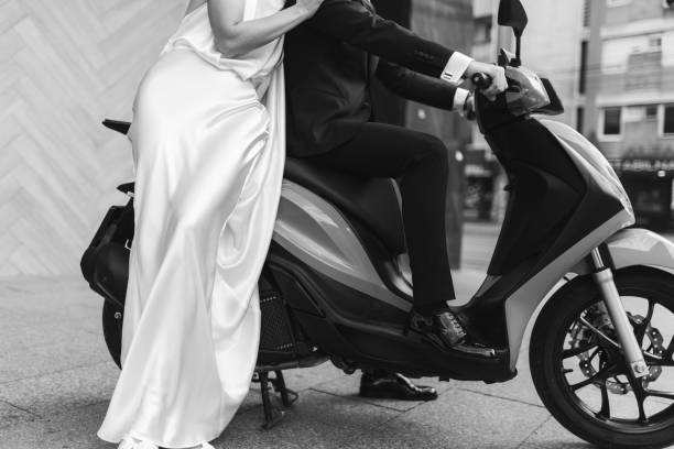 istock Wedding couple on motor scooter 2175187363