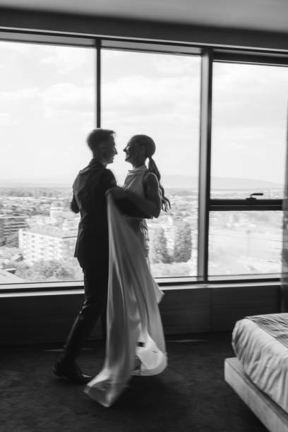 istock Newlyweds hugging at home 2175188512