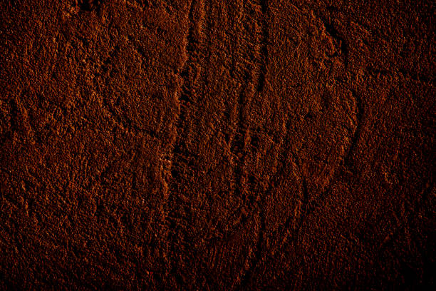 Brown colored abstract wall background with textures of different shades of brown