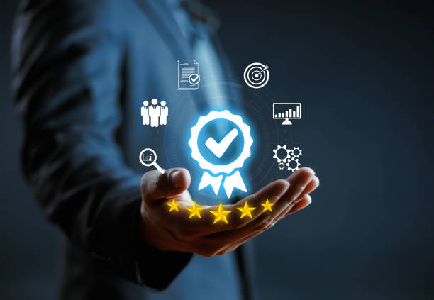 istock Businessman holding quality certification mark, audit, business, assurance, control, digital, service, complete, assessment, checklist, data with quality icon. 2175192404
