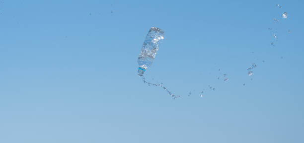 istock A plastic bottle overflowing with water in the air 2175193050