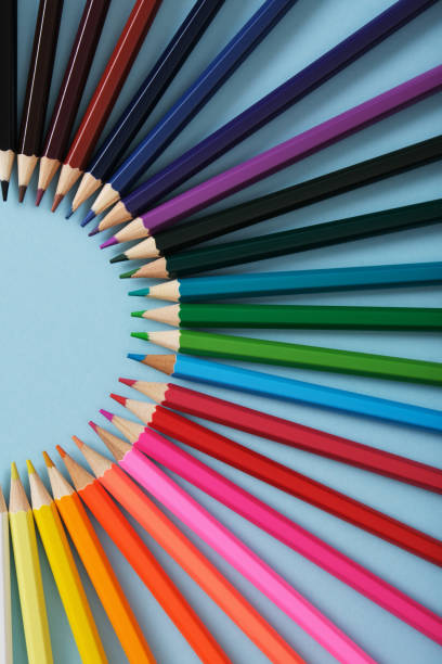 istock Frame in the shape of a semicircle stacked with colored pencils. Multipurpose background. Place for text. 2175195168