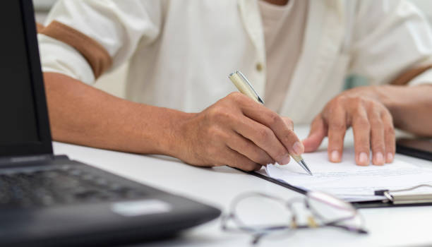 istock sign contract partnership or employment 2175195189