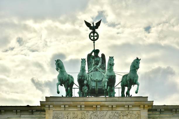 Brandenburger Tor, brandenburg gate sculpture on cloudy sky