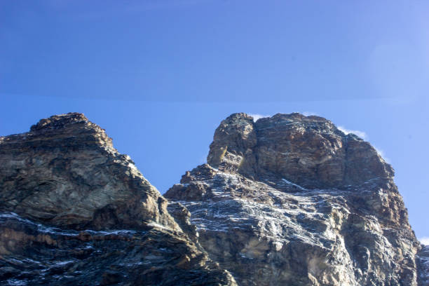 Matterhorn mountain peak view from helicopter in flight, Aosta Valley