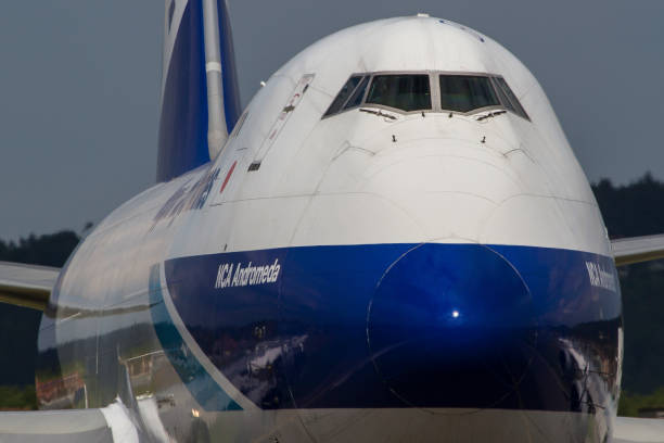 Cargo plane Boeing 747 of Nippon Cargo Airlines lining up the runway in Graz, Austria Graz, Austria - May 17, 2016: Huge cargo plane Boeing 747 of Nippon Cargo Airlines lining up the runway in Graz, Austria nippon cargo airlines photos stock pictures, royalty-free photos & images
