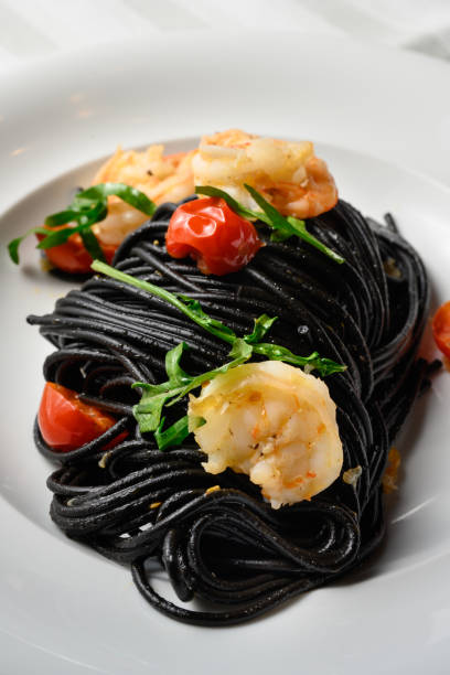 Spaghetti al Nero di Seppia with Squid Ink and Prawns