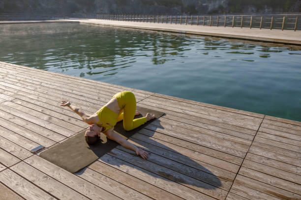istock Engage in a Yoga Practice by the Water Experience a Serene Outdoor Setting Today 2175216863