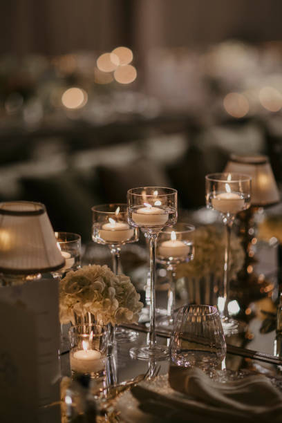 istock Romantic Candlelight in Glass Candleholders on a Dinner Table. stock photo 2175216953