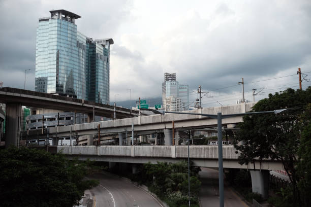 Elevated roads and metro train tracks in Kwai Chung, an urban area within Tsuen Wan New Town in the New Territories of Hong Kong.