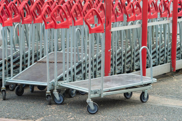 istock A row of red carts with red handles are lined up 2175223232