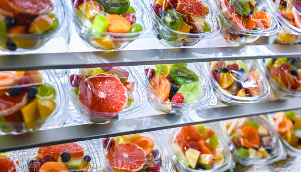 istock Boxes with pre-packaged fruit salads in a commercial fridge 2175224453