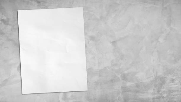 istock empty blank white grunge paper sheet placed on light grey concrete table counter, top view. sheet of blank note paper with blank space for design. blank note book page on top of a table, flatlay. 2175227325