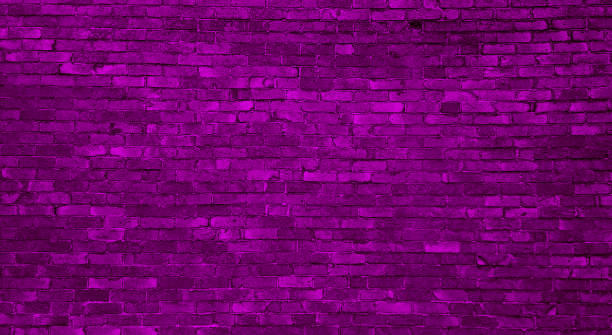 istock old dark purple brick wall of an old architecture building. brick wall texture. abstract violet masonry of stone blocks. 2175227571