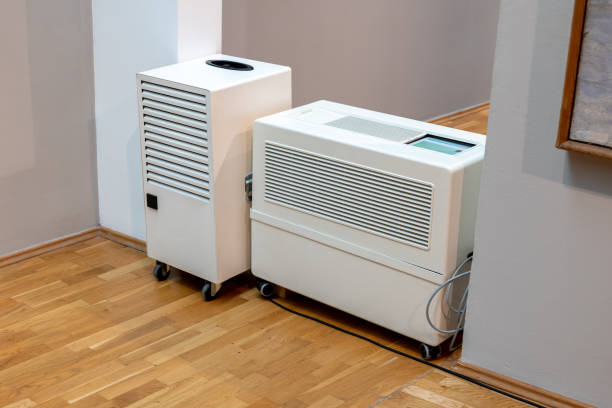 istock A modern industrial dehumidifier and an air purifier machine inside a museum, exhibition hall interior, keeping right air conditions, humidity levels control technology, old art protection concept 2175228064