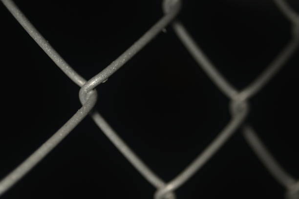 macro shot of the wire mesh grid with a black background.