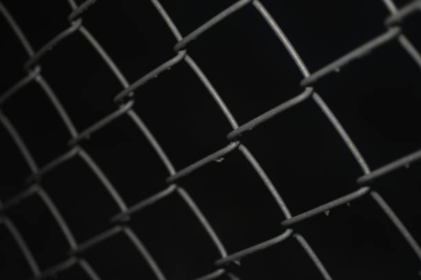 macro shot of the wire mesh grid with a black background.