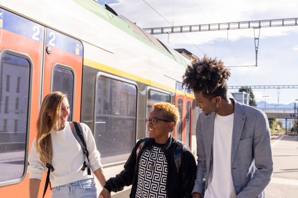istock Diverse family about to get on a train journey 2175229744