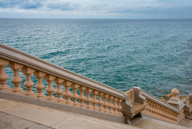 istock Staircase railing towards the sea 2175234397