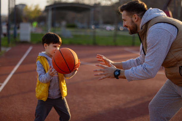 istock Father and Son Playing Basketball 2175244414