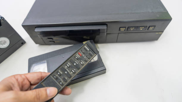 istock VCR with old VHS tapes and remote control 2175248335