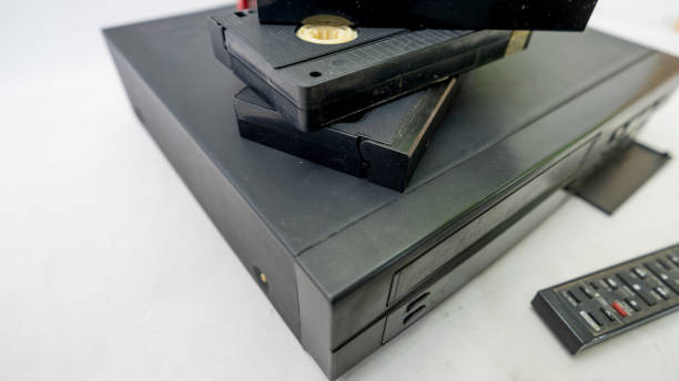 istock VCR with old VHS tapes and remote control 2175248348