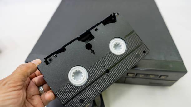 istock VCR with old VHS tapes and remote control 2175248350