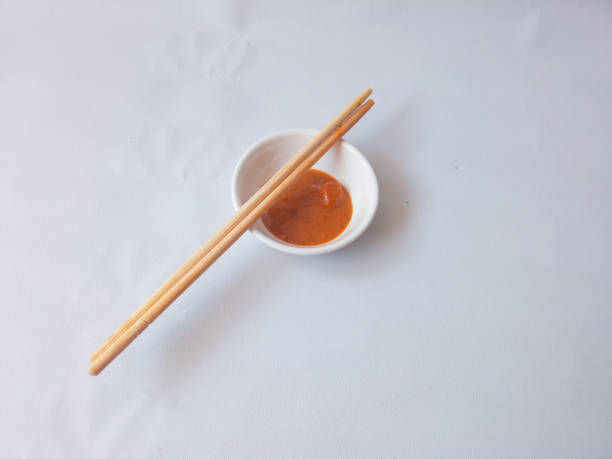istock rendang chili sauce on white saucer isolate on white 2175264257