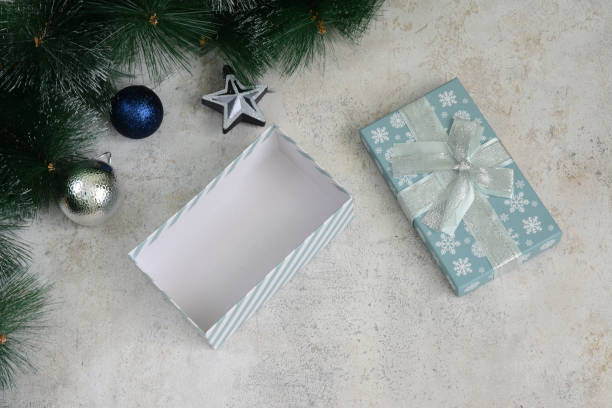 istock a gift that is wrapped in a blue and white gift box 2175266646