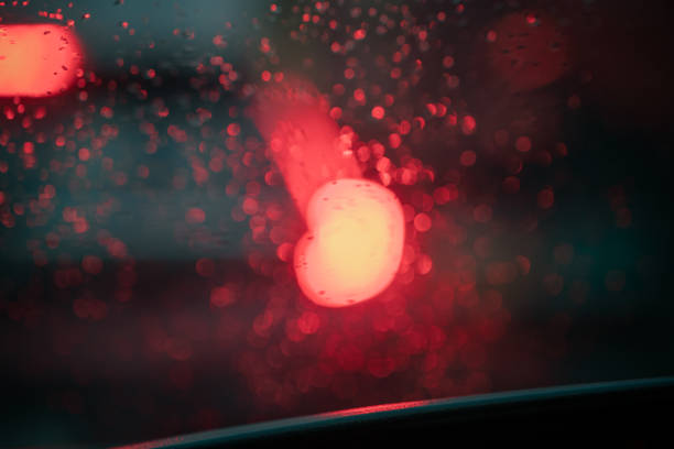 This evocative image captures the essence of an evening commute in Dhaka, with cars stuck in traffic on a rainy evening. The focus on raindrops on the car’s windshield and the blurred red tail lights in the background add a layer of atmosphere, highlighting the challenges of urban transportation in Bangladesh’s bustling capital. This photograph is ideal for projects related to urban life, transportation issues, and the daily hustle of city living.