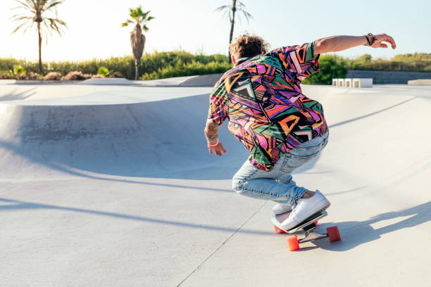 istock back view of funky young male skateboarder 2175280871