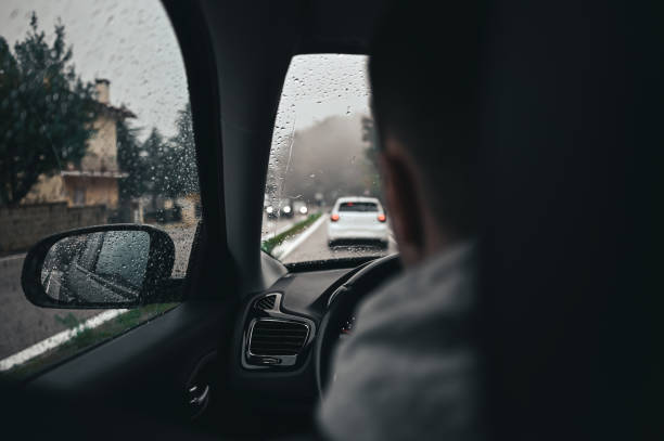 istock Driving in the rain storm close up. 2175280931