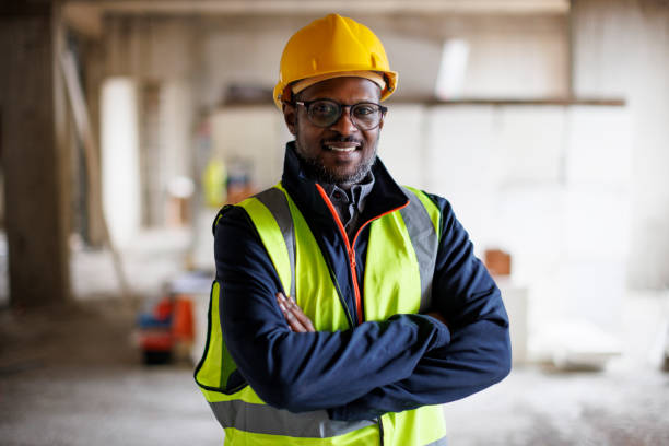 istock Portrait of confident smiling engineer at construction site 2175282508