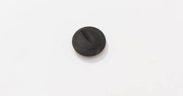 istock Minimalistic black spinning top on white background, capturing simplicity and elegance in modern design. 2175297175