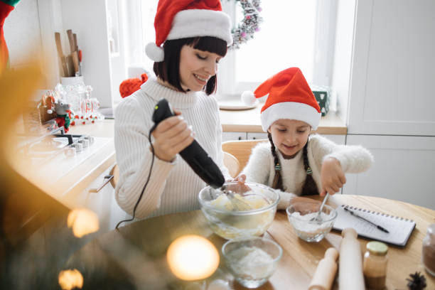 istock Mother and daughter baking during Christmas at home 2175297256