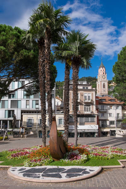 Alto Adige, Italy - September 15, 2024: Gardens and palm trees on the promenade of Merano