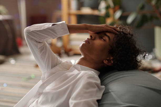 istock Sick guy with symptoms of hangover 2175300308
