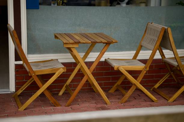 istock Wood bistro table and two chairs 2175301391