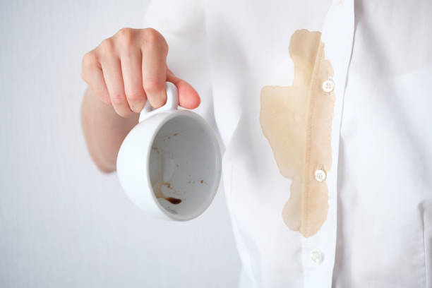 istock Dirty brown coffee stain on clothes. 2175302305