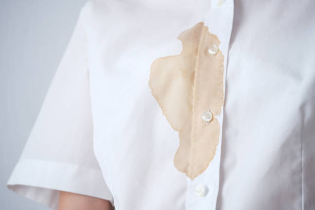 istock Dirty brown beverage or sauce on clothes. 2175302709