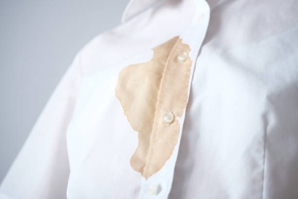istock Dirty brown beverage or sauce on clothes. 2175302859