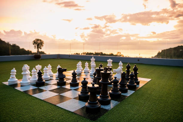 istock black and white chess game with andaman sea at sunset, Phuket 2175304993