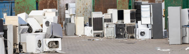 istock Discarded appliances in an e-waste disposal area 2175305697