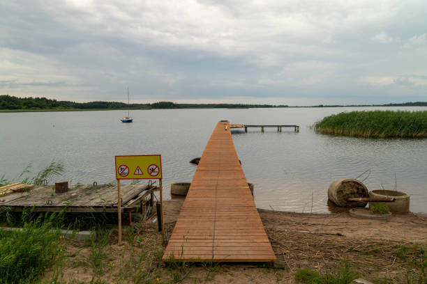 istock A wooden dock extends into the tranquil lake waters at dusk 2175307542