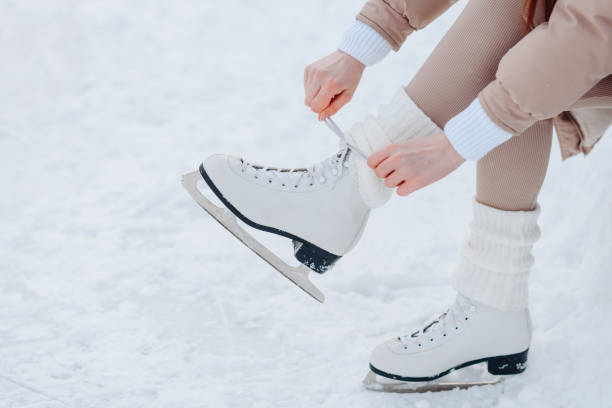 istock young redhead girl in ice rink 2175307553