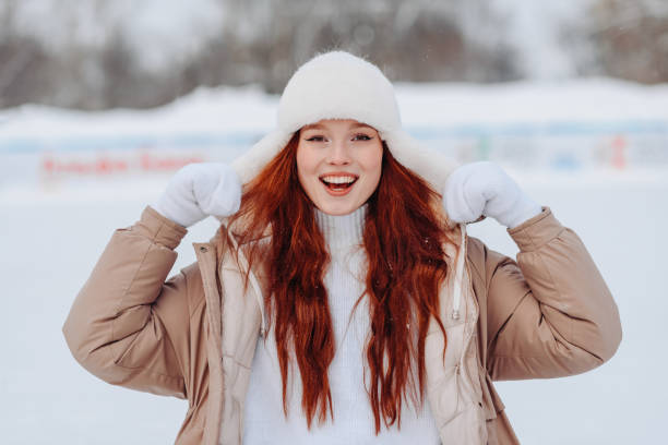 young redhead girl in ice rink