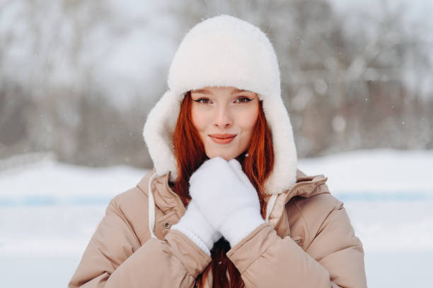 istock young redhead girl in ice rink 2175307590