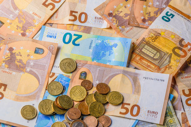 Euro money.Several euro coins and banknotes.Macro.